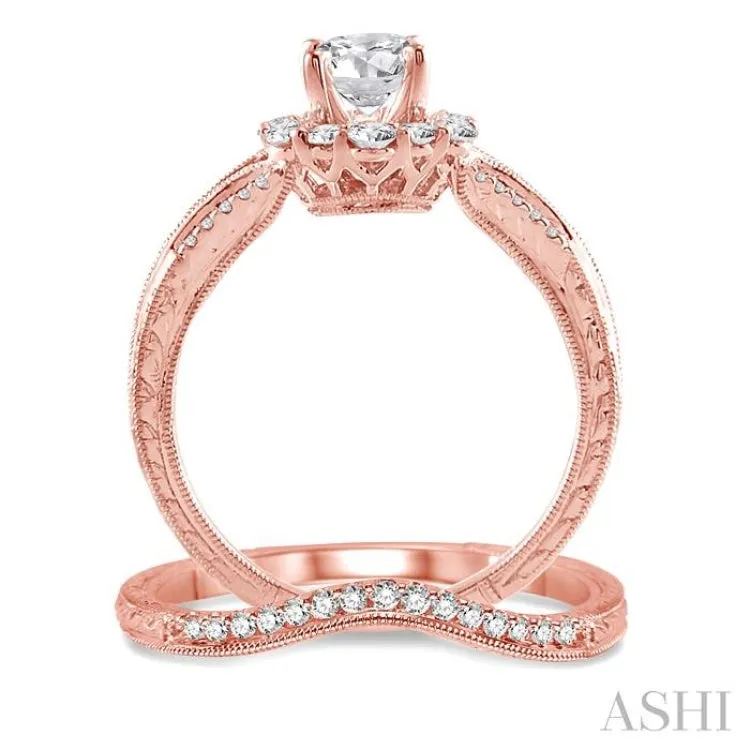 1 1/10 Ctw Diamond Wedding Set with 1 Ctw Round Cut Engagement Ring and 1/10 Ctw Wedding Band in 14K Rose Gold