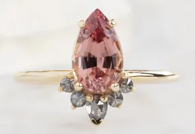 The Aster Ring with a 1.59ct Pear-Cut Garnet