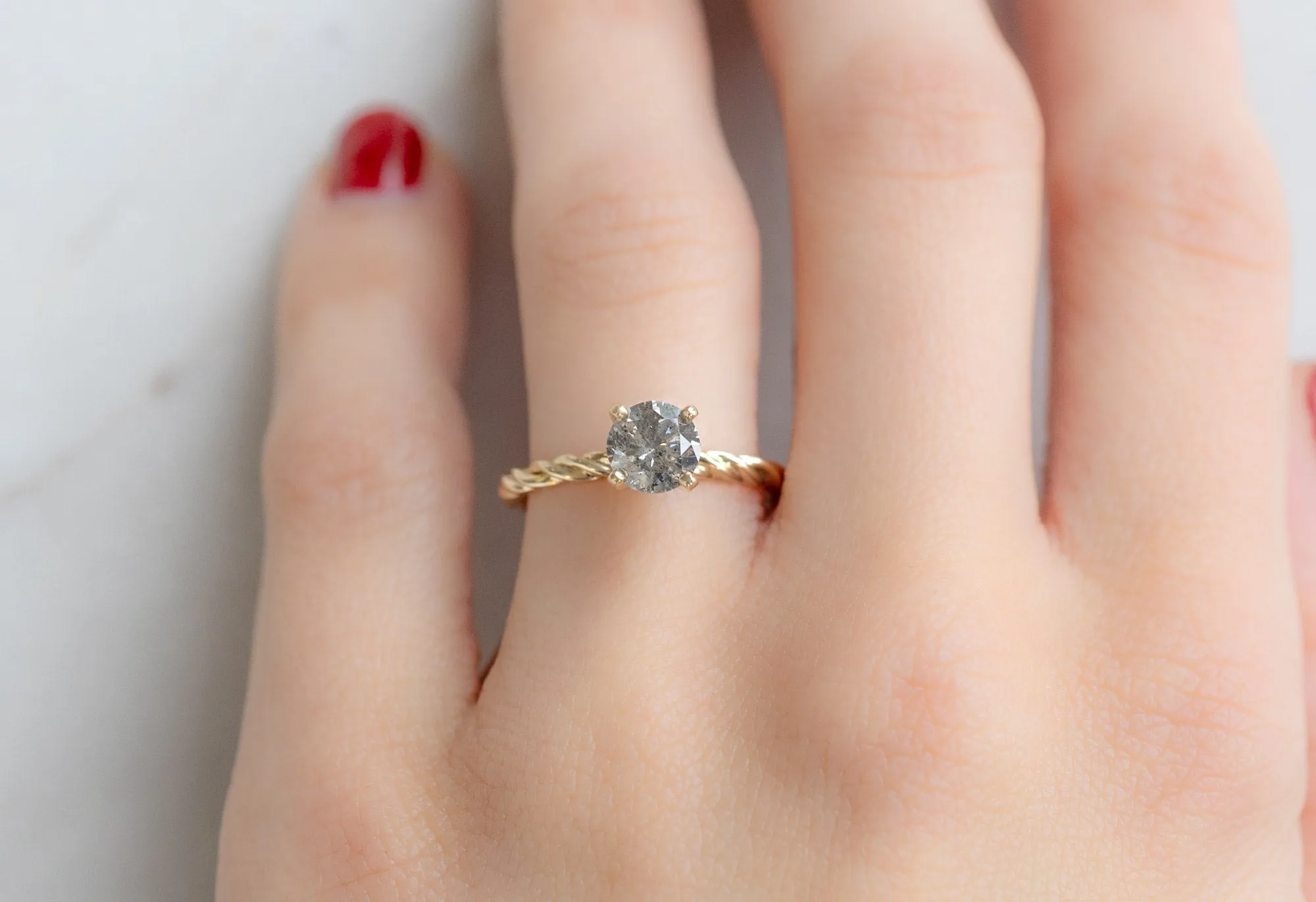 The Braided Band Ring with a 1.01ct Round Salt and Pepper Diamond