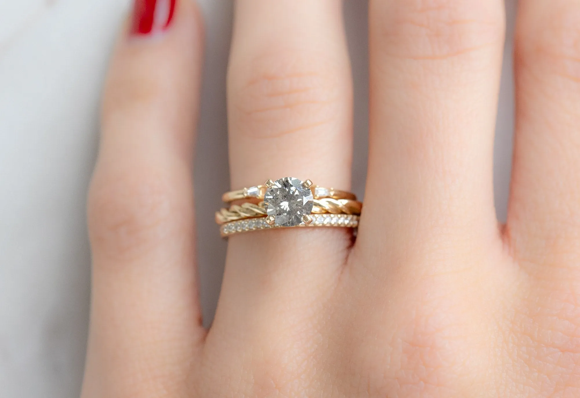 The Braided Band Ring with a 1.01ct Round Salt and Pepper Diamond